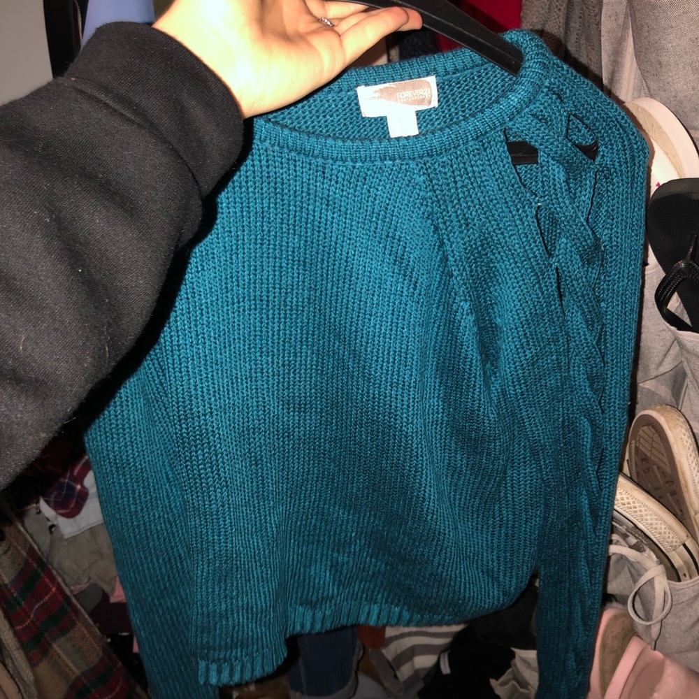 Teal sweater with shoulder braids